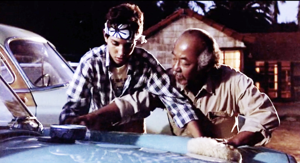 Miyagi-showing-Daniel-How-to-Wax-Cars-The-Karate-Kid