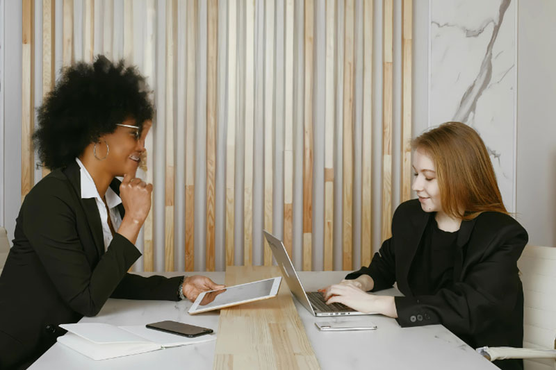 2 women meeting
