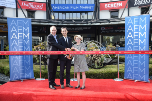 Jonathan Wolf, Executive Vice President & Managing Director of The American Film Market (AFM),  Chris Lo, Los Angeles Hong Kong Trade Development Council (HKTDC), and Jean Prewitt, President & CEO of IFTA, at the ribbon cutting for Hong Kong Day at AFM. 